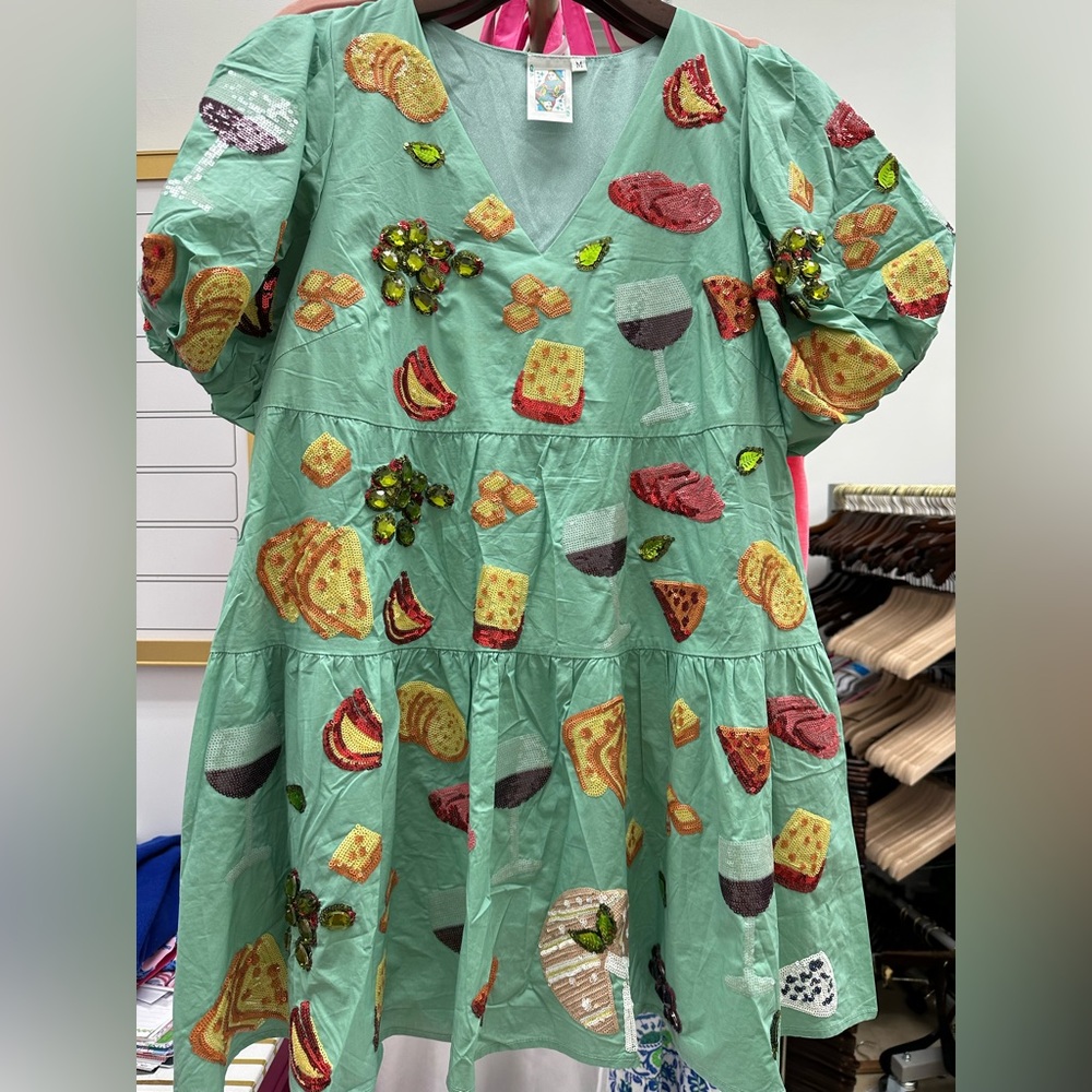 Queen of sparkles charcuterie dress size medium with flaw